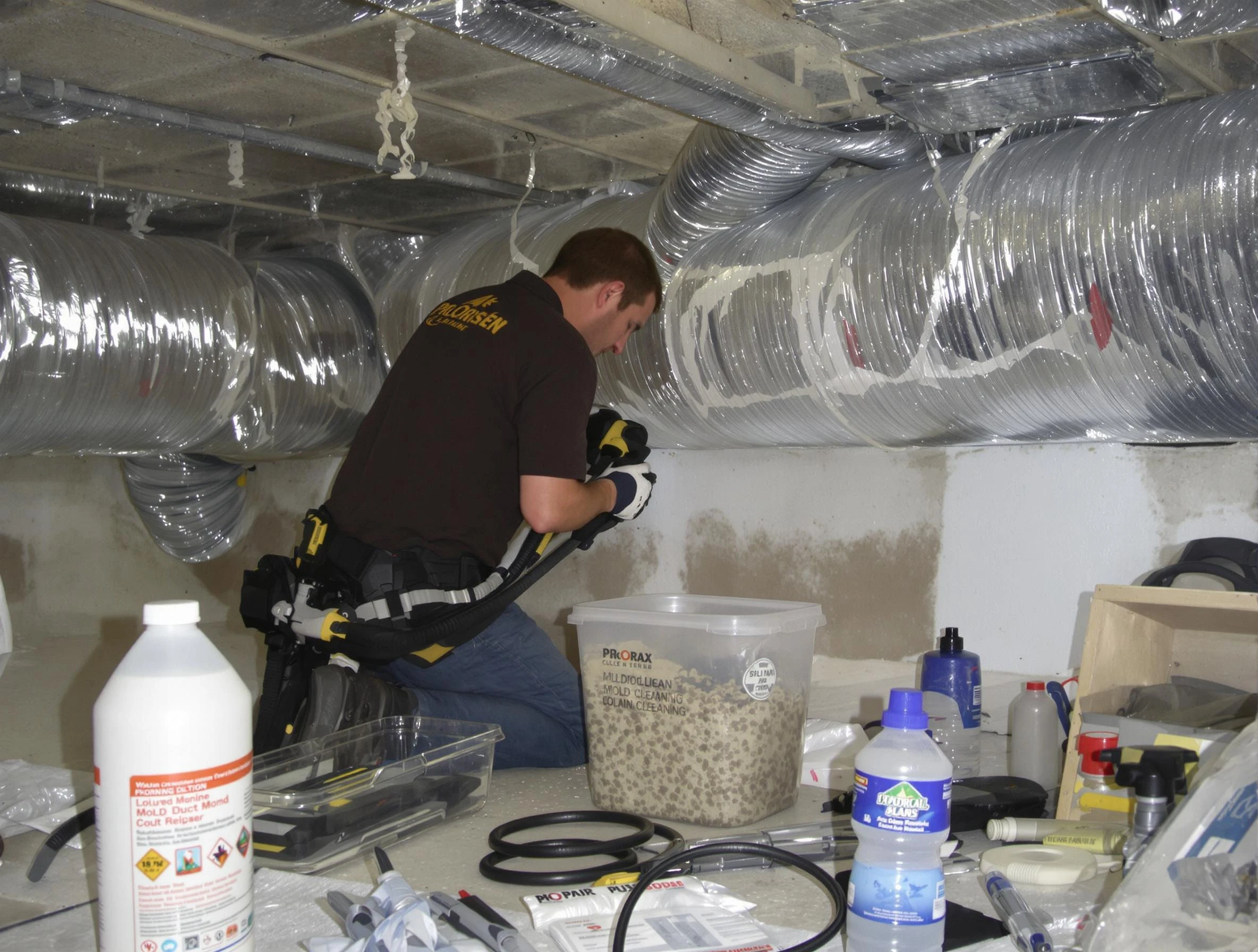 Peoria Air Duct Cleaning specialist performing professional mold removal from air ducts in Peoria